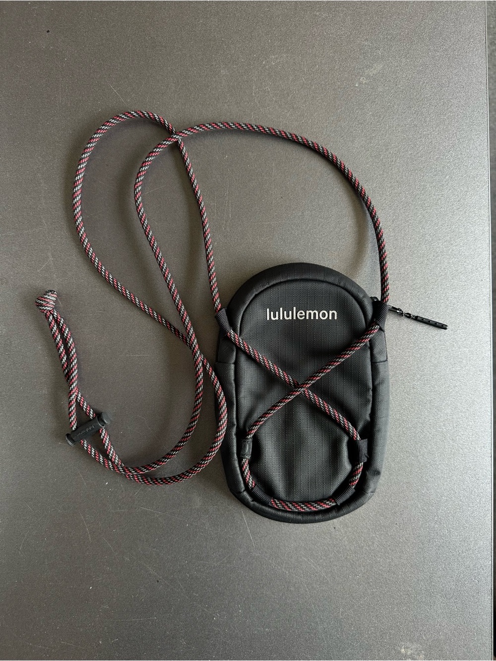 lululemon athletica Black Crossbody Phone Pouch with Black & Red Rope Strap